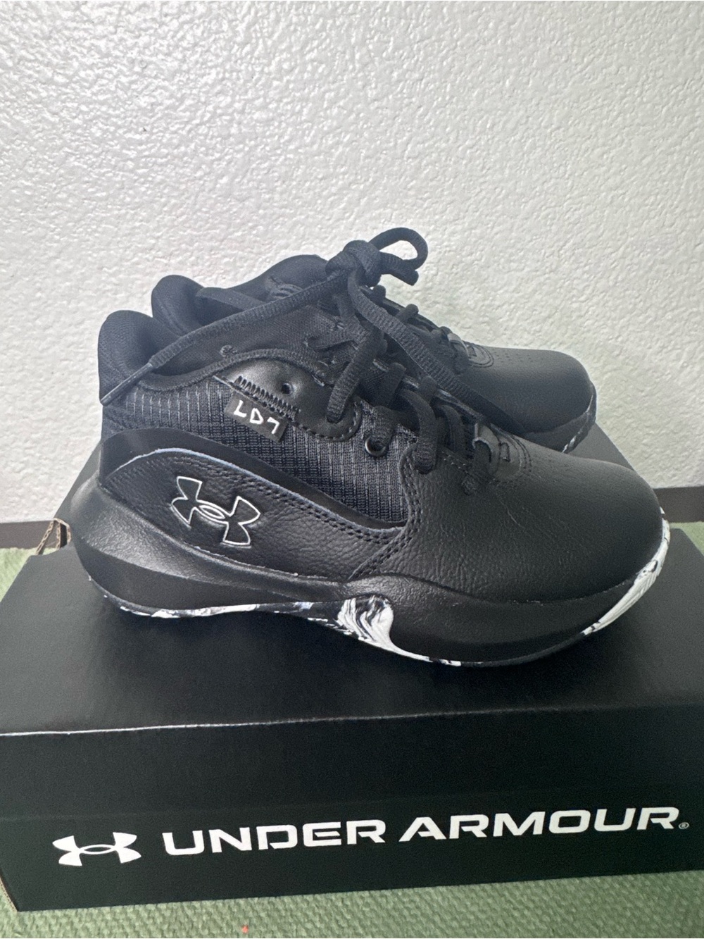 Under Armour Kids Black Sneakers with White Sole Accents
